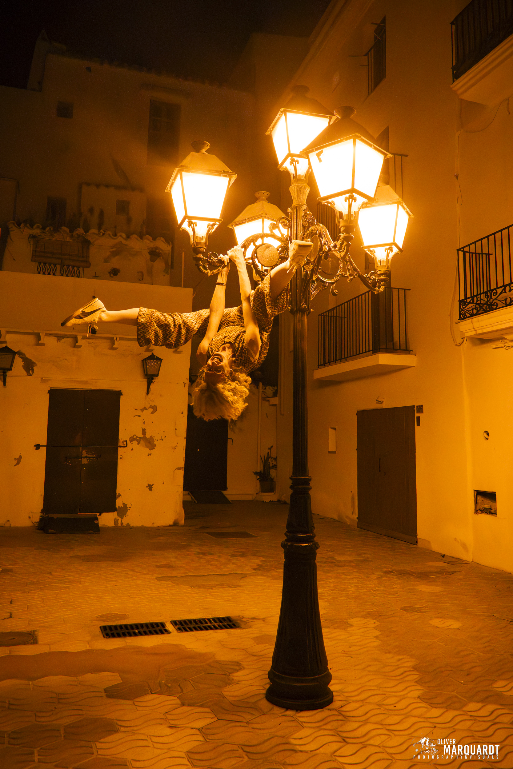 Pole dancer stretch outdoors